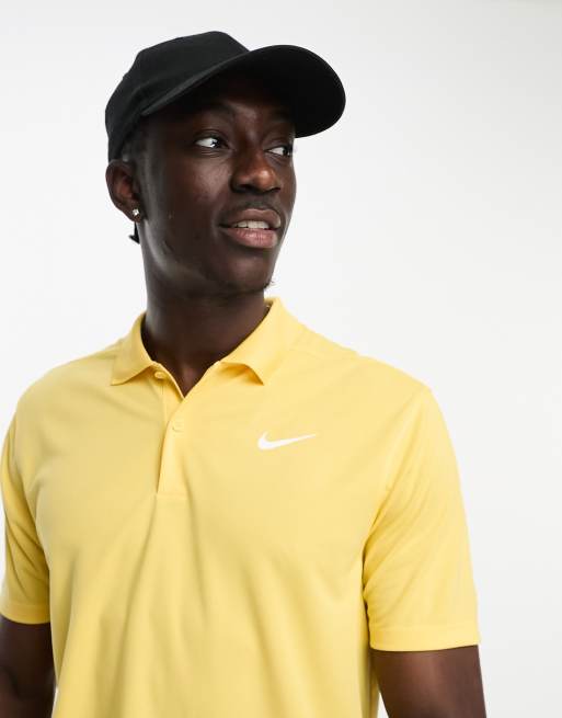 Nike golf shirt yellow sale