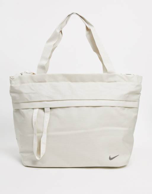 Nike – Gräddvit toteväska i oversize-modell med Swoosh-logga