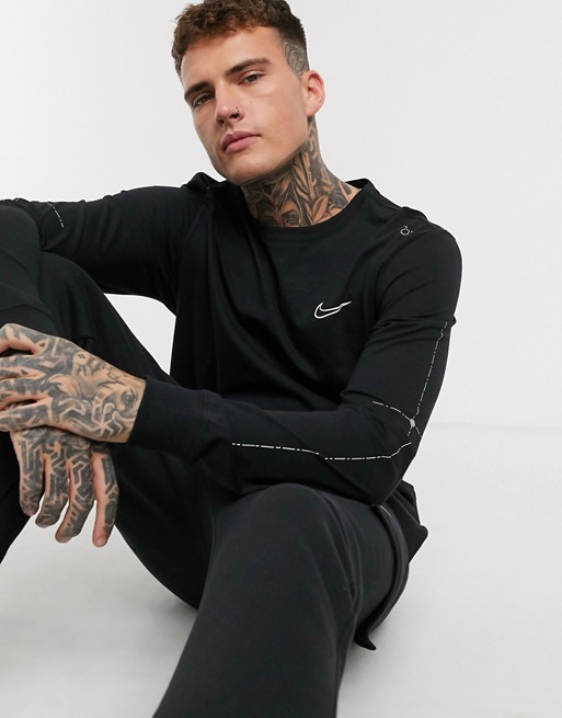 Nike graphic outline swoosh long sleeve t-shirt in black