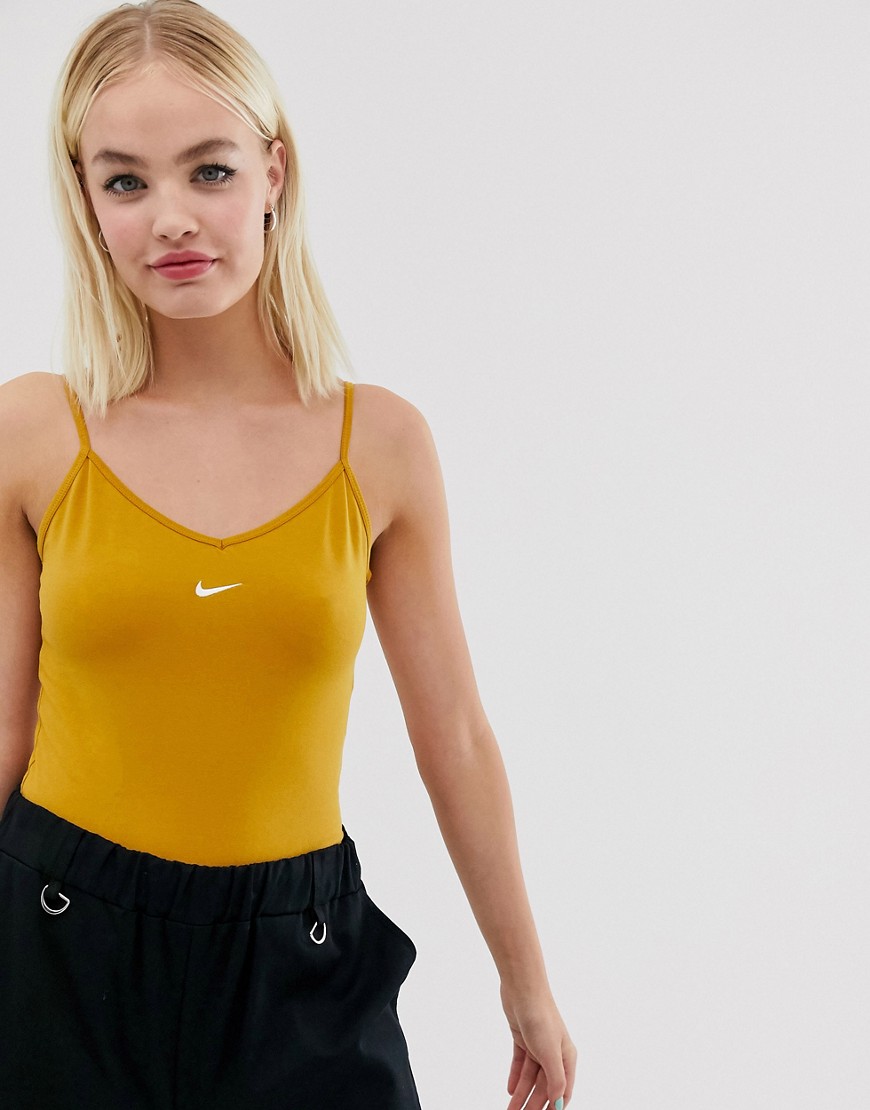 Nike – Guldfärgad body med liten Swoosh-logga