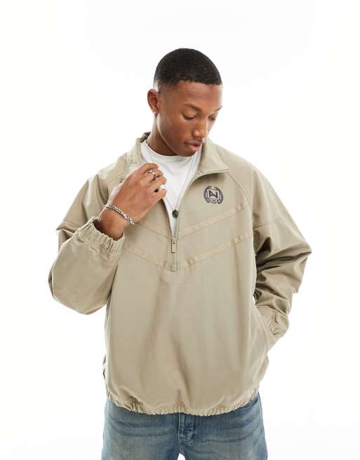 Nike half zip jacket in beige ASOS