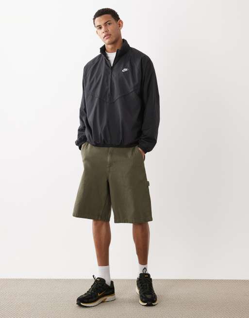 Nike half zip logo jacket in black | ASOS