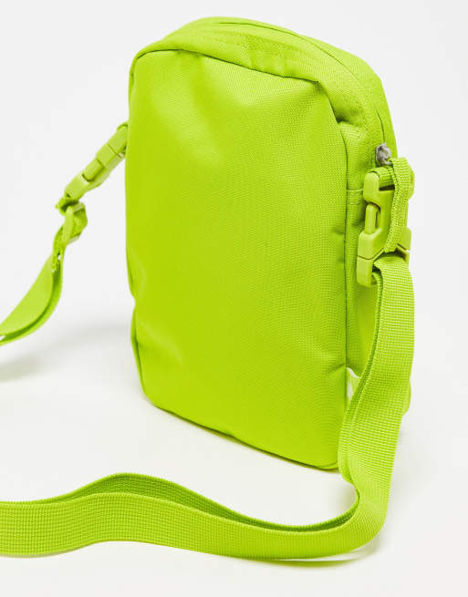 Nike Heritage cross body bag in lime green