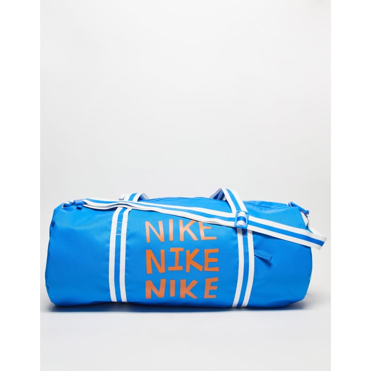 Orange nike duffle top bag