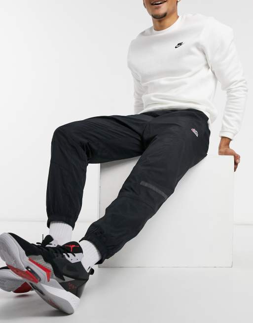 nike air woven cuffed joggers black