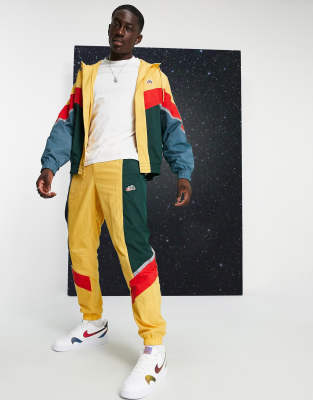 Nike best sale mustard tracksuit