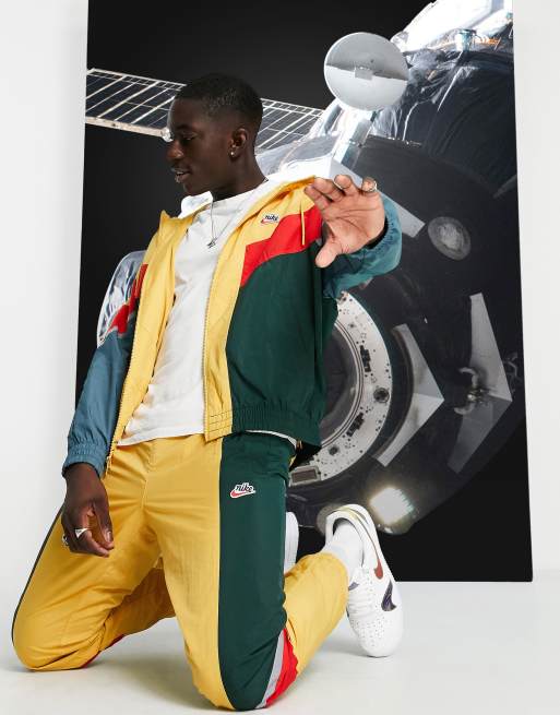 Nike Heritage Essentials Windrunner cuffed woven joggers in mustard