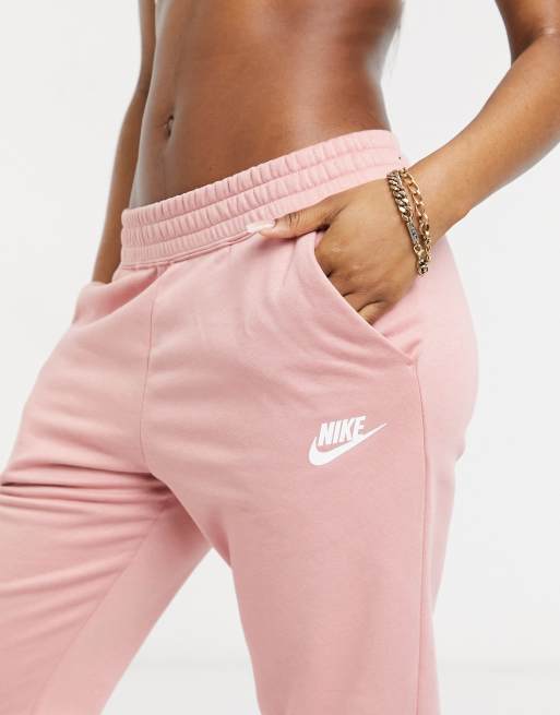 Nike women's sportswear tracksuit joggers rust pink on sale