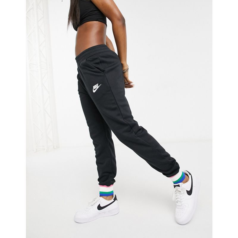Donna Joggers Nike - Heritage - Joggers in felpa neri con polsini a righe