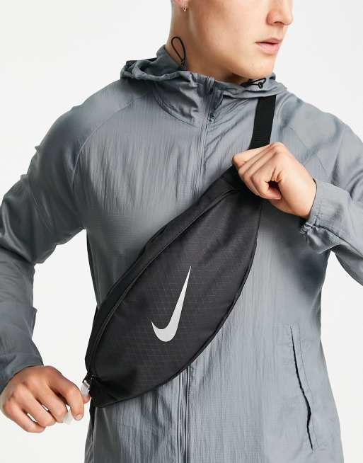 Nike Heritage waistpack in black with metallic logo