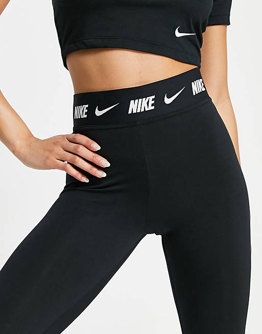 Nike high waisted leggings in black with logo waistband