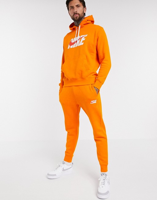 Nike hoodie tracksuit set in orange