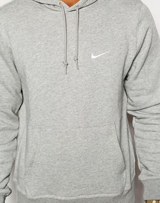 grey nike jumper with red tick