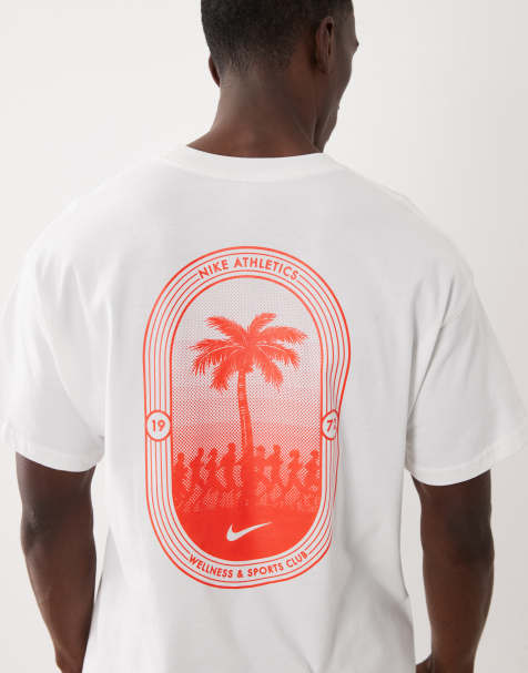 Nike - Hvid oversized T-shirt med palmeprint på ryggen og logo - view 1