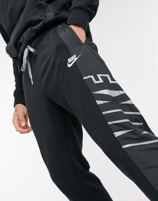 Nike Hybrid cuffed joggers in black ASOS