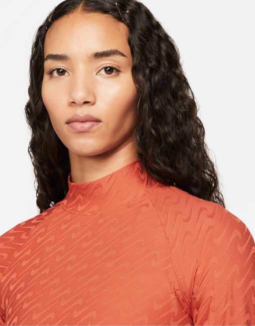 Nike Icon Clash all over logo print mock-neck long sleeve top in