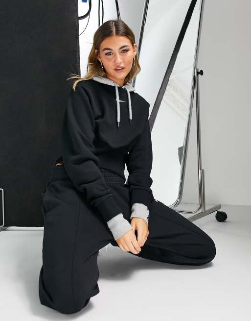 Nike Icon Clash crop fleece hoodie in black ASOS