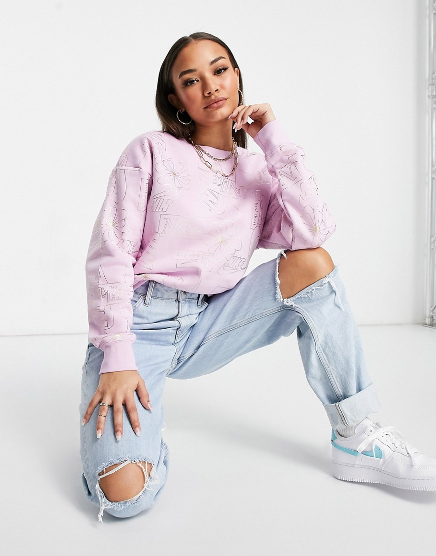 Nike icon clash fleece sweatshirt in pink with all-over logo print