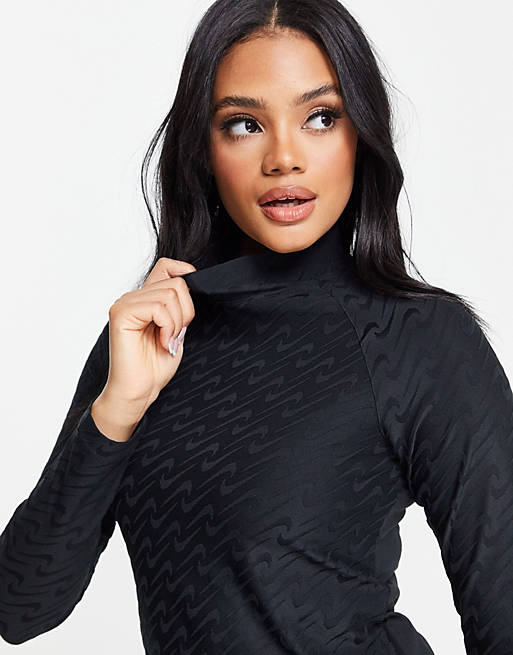 Women Nike Icon Clash mock neck long sleeve top with all over swoosh in black 