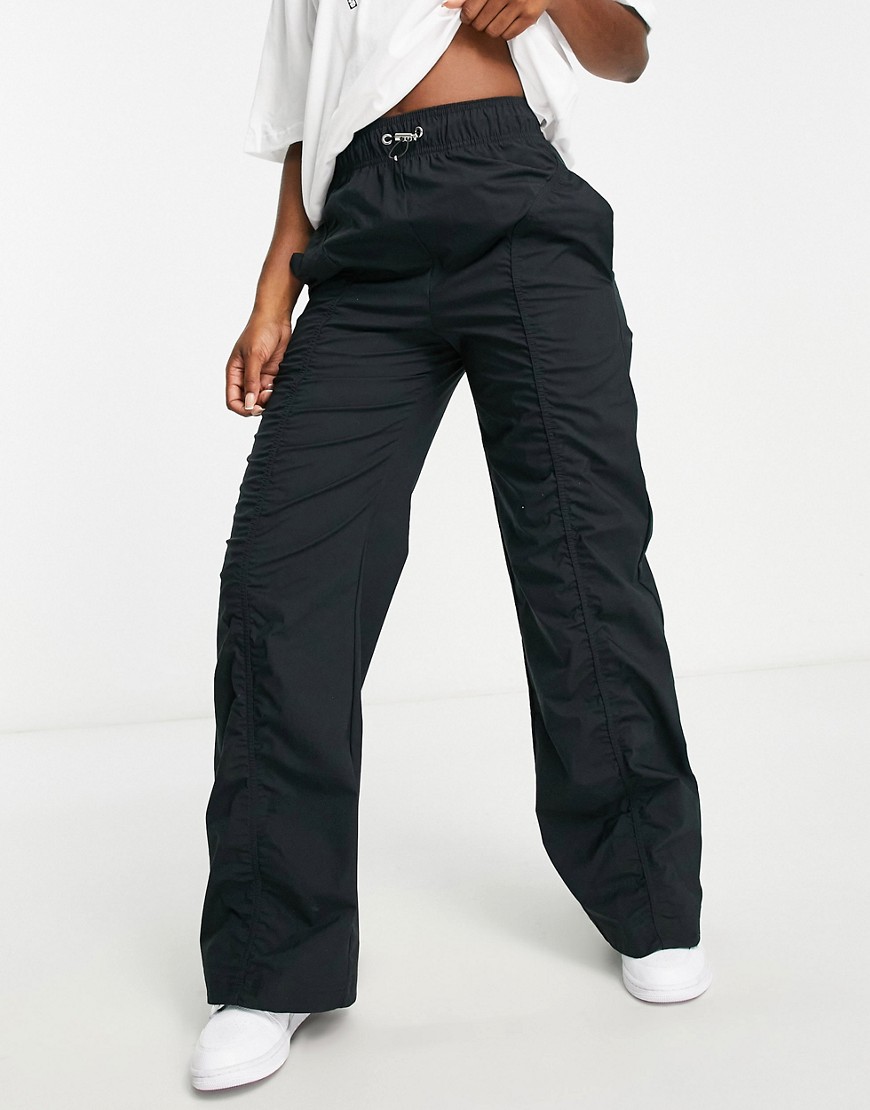 Nike Icon Clash ruched woven trousers in black