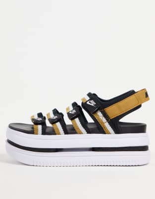 NIKE ICON CLASSIC PLATFORM SANDALS IN BLACK/GOLD