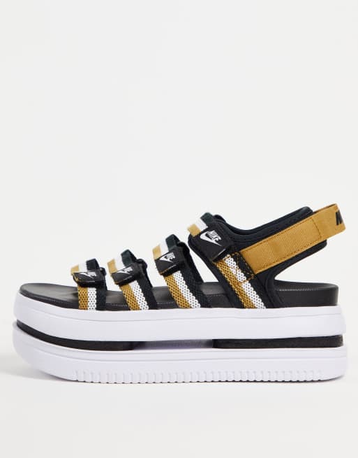 Nike black shop and gold sandals