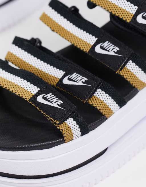 Gold and outlet black nike sandals