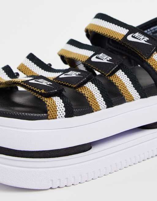 Nike Icon Classic platform sandals in black gold