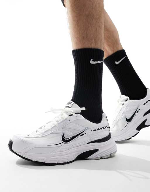 Nike Initiator sneakers in white and black 