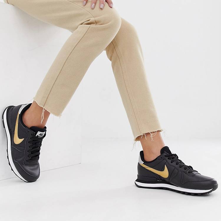 Vervullen inval wastafel Nike - Internationalist - Sneakers in zwart met goud | ASOS