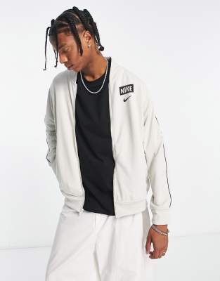 Nike full zip jacket in light bone - ASOS Price Checker