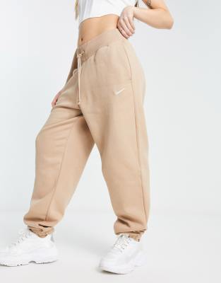 Nike – Jasnobrązowe joggersy oversize z wysokim stanem z małym logo Swoosh