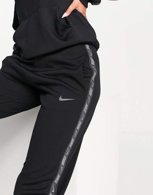 Pantalon nike avec bande sale