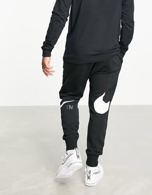 nike jogger en polaire à logo virgule