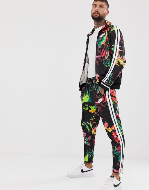 Pelmel Collega teugels Nike jogger in black floral print | ASOS