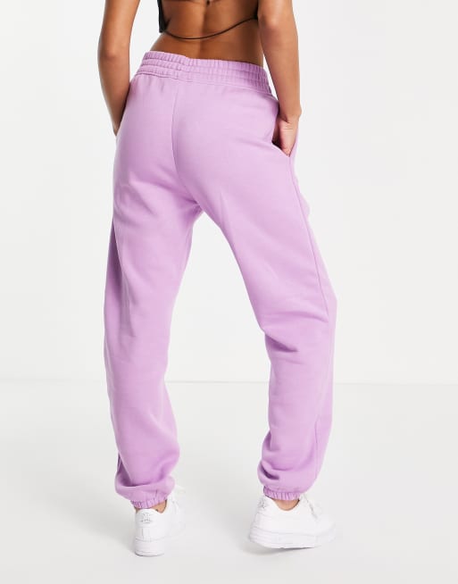 nike jogger oversize à petit logo virgule violet