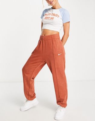 Nike - Jogger oversize en polaire - Orange délavé | ASOS