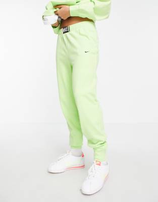 Nike Joggers a vita alta verde fluo slavato ASOS