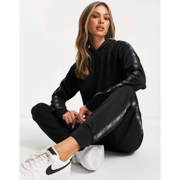 Nike tape poly hot sale track pants womens