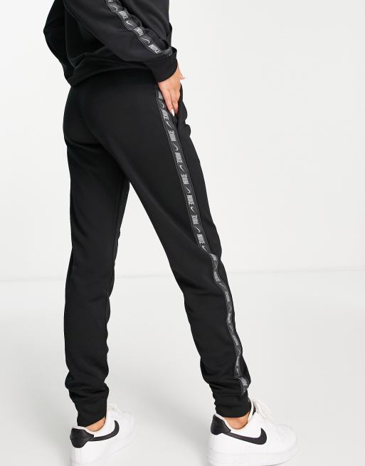 Nike taped joggers store black