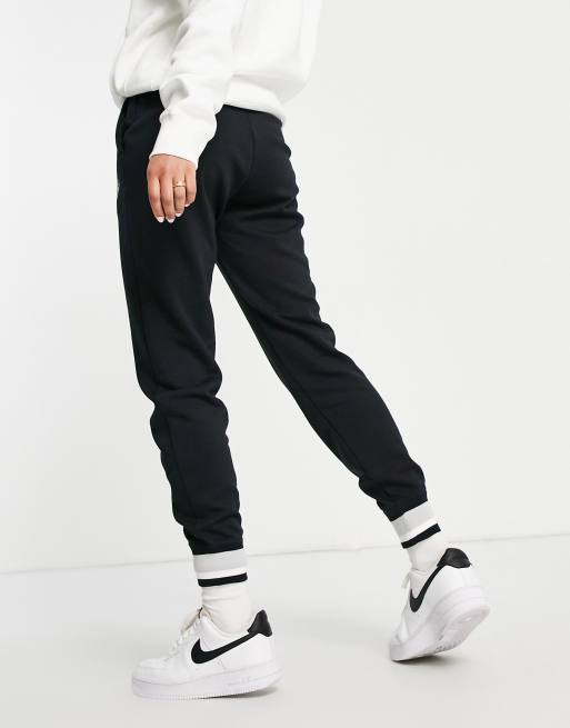 White and best sale black nike joggers