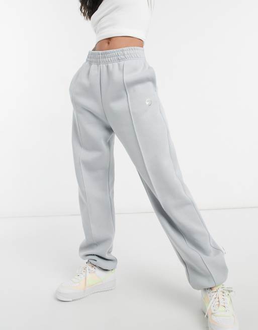 Nike joggers in dark grey neutral ASOS