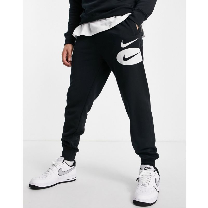 Activewear Pantaloni e leggings Nike - Joggers neri in pile con logo