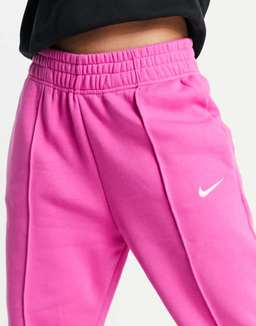 Tuta deals fucsia nike