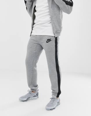 nike joggers with side stripe