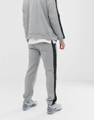 nike grey tape joggers