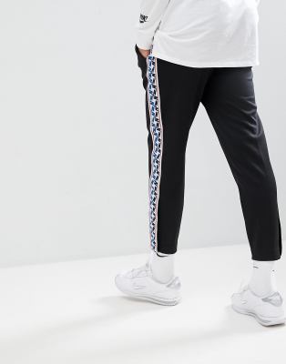 mens nike taped joggers