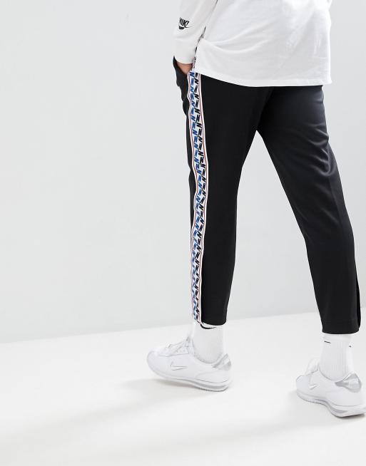 Nike Joggers With Taped Side Stripe In Regular Fit In Black AJ2297 010