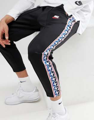 mens nike taped joggers