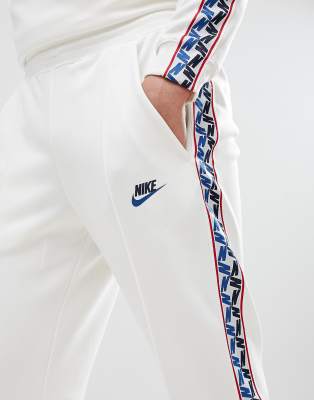 nike long sleeve top with taped side stripe in white
